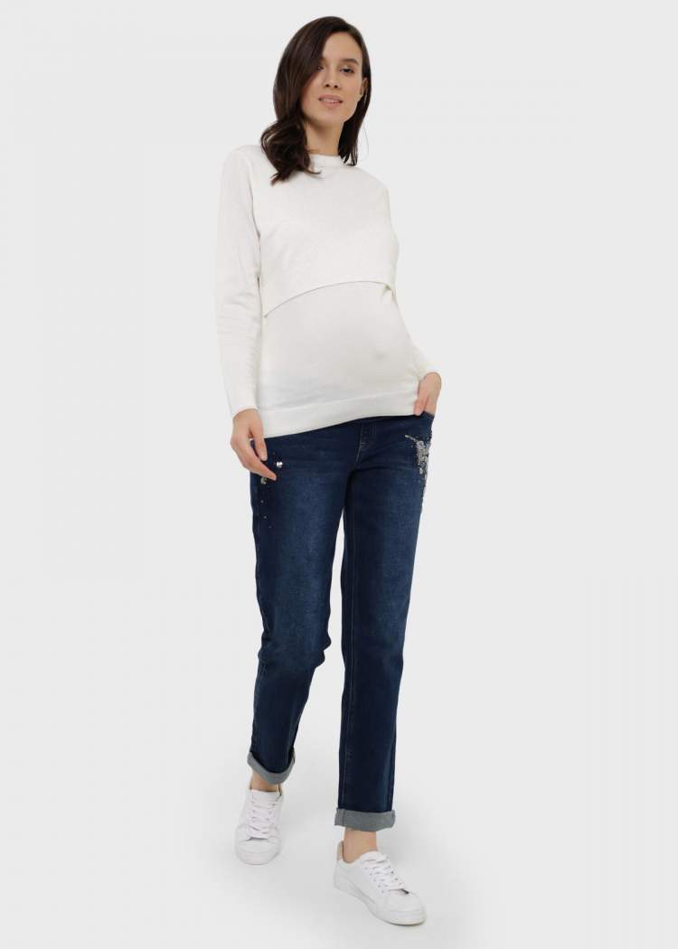 Джинсы ILM Стайл-038 для беременных; темно-синий (Арт. 104219) Удобные стильные базовые джинсы для беременных.
Модель свободного кроя "бойфренд"
Джинсы разработаны по специализированному лекалу для беременных.
Тип пояса: трикотажная вставка средней высоты с регулировкой степени утяжки.
Материал: хлопковый деним
Длина по внутреннему шву: 74 см 
Детали: вышивка "птица" из бисера и пайеток
Карманы: 2 передних боковых кармана, 2 накладных кармана сзади 
Рекомендации по уходу: деликатная стирка в стиральной машине при 30°C
Состав: 98% Хлопок / 2% Эластан